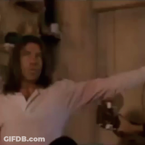 Man With Long Hair Holding Guitar GIF