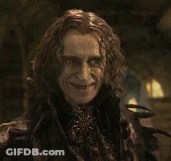 Man With Long Hair Holding Hammer GIF