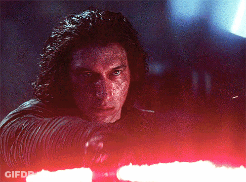 Man With Long Hair Holding Red Lightsaber GIF