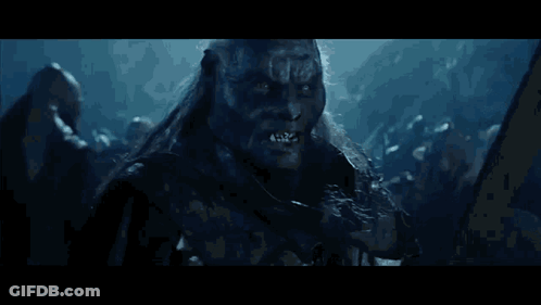 Man With Long Hair Holding Sword GIF