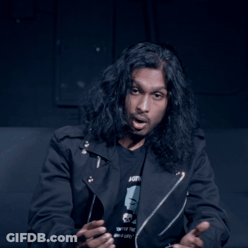 Man With Long Hair In Black Jacket Wearing Both T-Shirt GIF