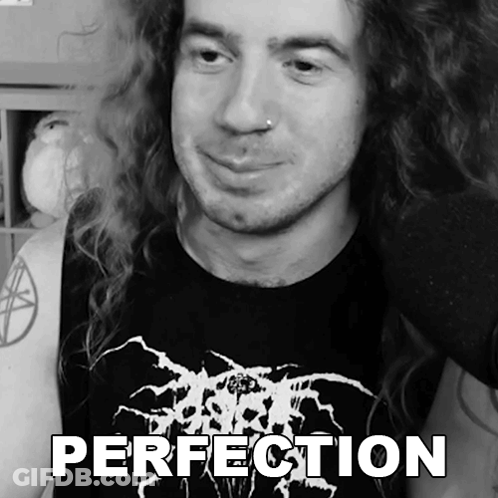 Man With Long Hair In Black Shirt Saying Perfection GIF