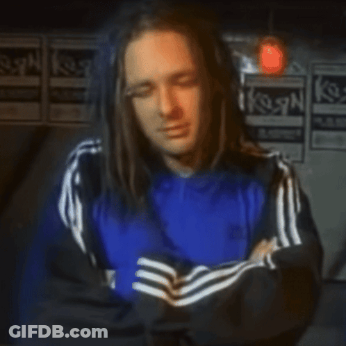Man With Long Hair In Blue Adidas Jacket GIF
