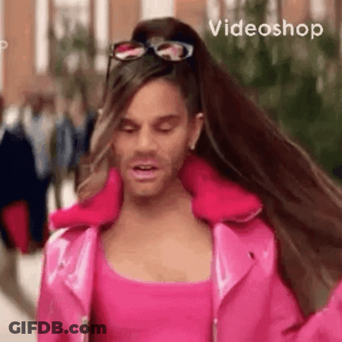 Man With Long Hair In Pink Jacket GIF