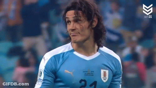 Man With Long Hair In Soccer Jersey Number 21 GIF