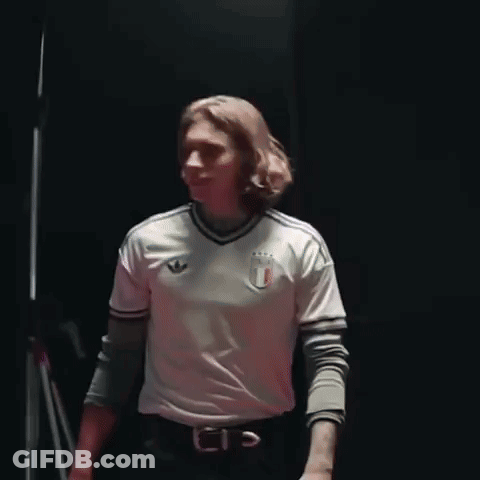 Man With Long Hair In White Adidas Shirt GIF
