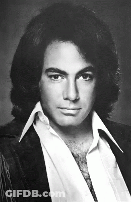Man With Long Hair In White Shirt GIF