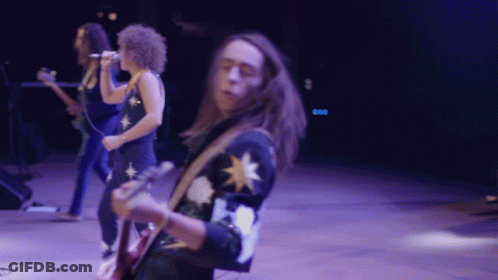 Man With Long Hair Playing Guitar In Band GIF