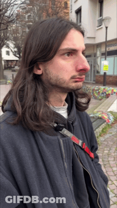 Man With Long Hair Red Nose Black Jacket GIF
