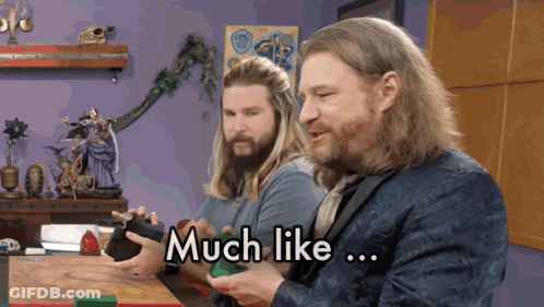 Man With Long Hair Says Much Like As Man Watches GIF