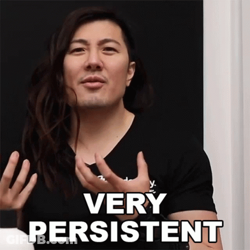 Man With Long Hair Says Very Persistent In Black Shirt GIF