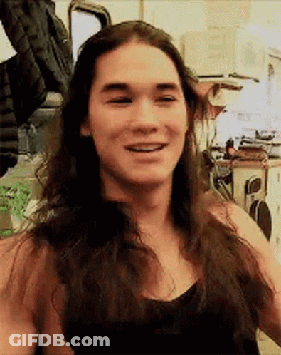 Man With Long Hair Smiling Black Tank Top GIF