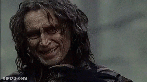 Man With Long Hair Smiling Holding Bird GIF