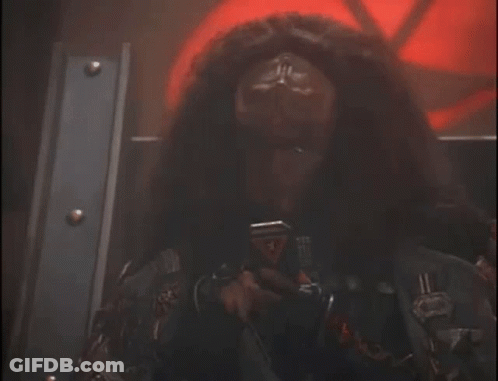 Man With Long Hair Wearing Eagle Jacket GIF