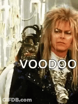 Man With Long Hair Wearing Mask Voodoo GIF