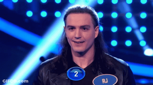 Man With Long Hair Wearing Name Tag RJ GIF