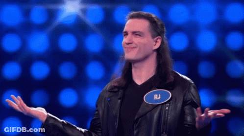 Man With Long Hair Wearing RJ Name Tag GIF