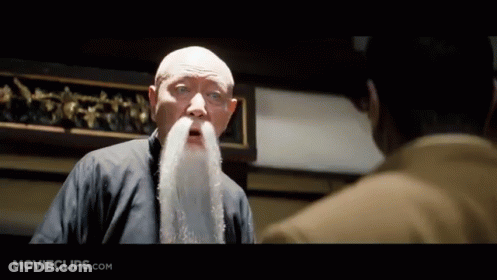 Man With Long White Beard Talking To Another Man GIF