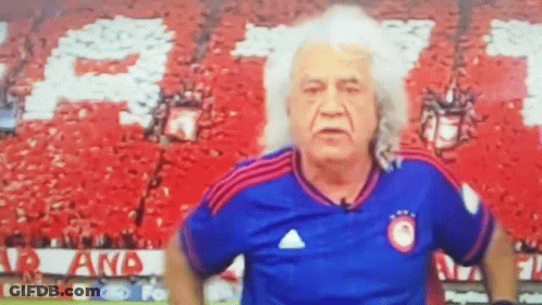 Man With Long White Hair Wearing Bravia Blue Shirt GIF