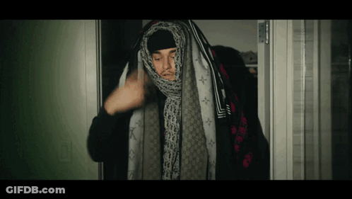 Man With Louis Vuitton Scarf Around Head GIF