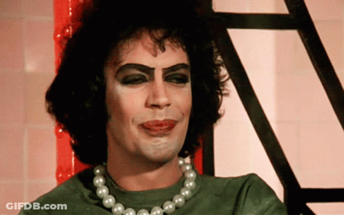 Man With Makeup And Pearl Necklace GIF