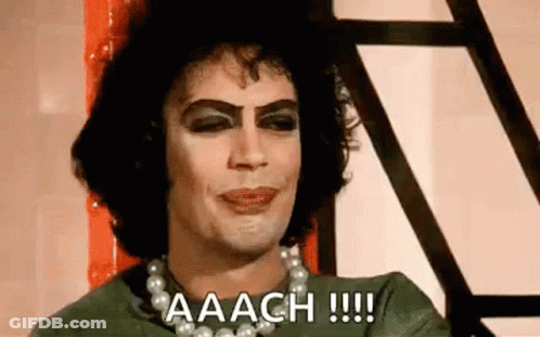 Man With Makeup Pearl Necklace Green Shirt GIF