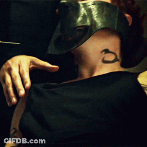 Man With Mask And Tattoo On Neck GIF