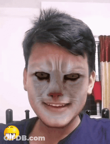 Man With Mask And Yellow Smiley Face GIF