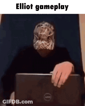 Man With Mask Sitting At Laptop GIF