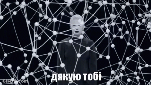 Man With Mask Surrounded By White Lines And Dots GIF