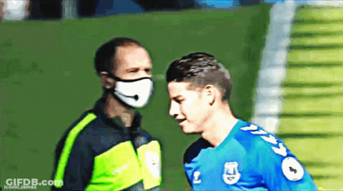 Man With Mask Talking Soccer Player Blue #9 GIF