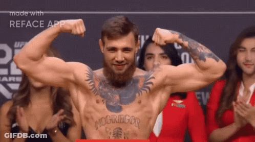 Man With McGregor Tattoo Flexing GIF