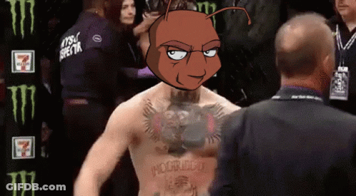 Man With McGregor Tattoo Talks To Another Man GIF