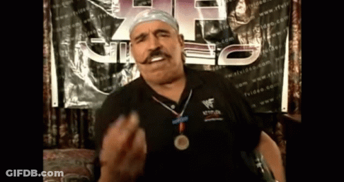 Man With Medal At WWF Sign GIF