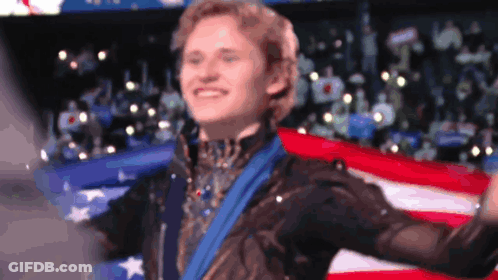 Man With Medal In Front Of American Flag GIF