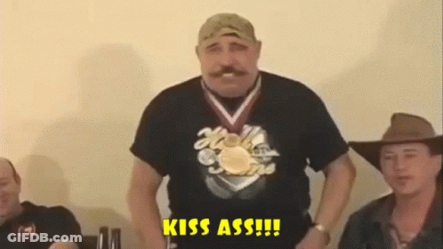 Man With Medal Saying Kiss Ass GIF