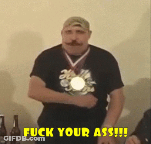 Man With Medal Says Fuck Your Ass GIF