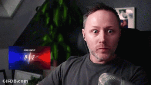 Man With Microphone And 0/2 Screen GIF