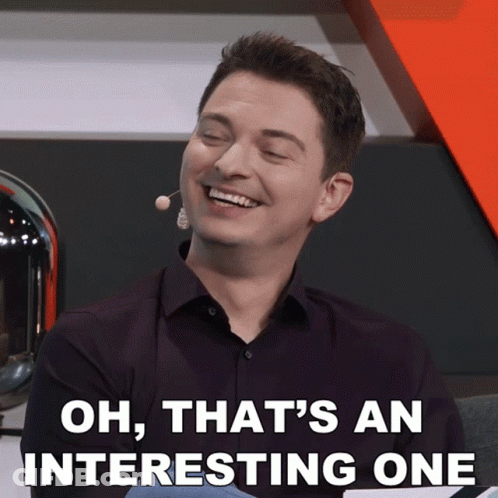 Man With Microphone In Ear Smiling Oh That's An Interesting One GIF