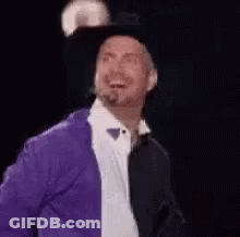 Man With Microphone In Mouth WTF Girth Brooks GIF