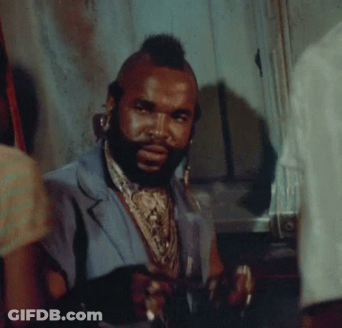 Man With Mohawk And Beard In Blue Vest GIF
