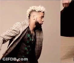 Man With Mohawk And Beard In Plaid Jacket GIF