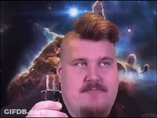 Man With Mohawk And Mustache Holding Cell Phone In Space GIF