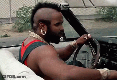 Man With Mohawk Driving Car GIF