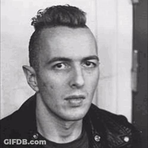 Man With Mohawk In Black And White GIF