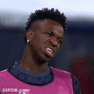 Man With Mohawk Making Funny Face In Pink Vest GIF