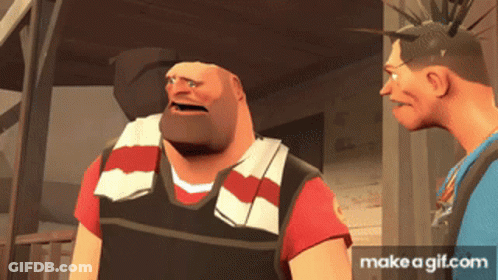 Man With Mohawk Talking To Another Man GIF