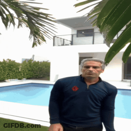 Man With Monogram Shirt At House GIF
