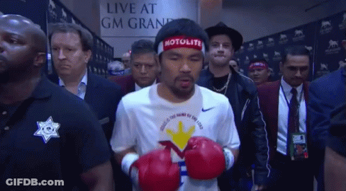 Man With Motolite Headband Walks Through Crowd GIF