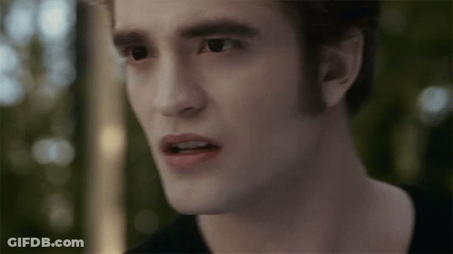 Man With Mouth Open And Trees In Background GIF